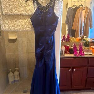 Stunning, blue jewel-toned gown